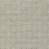 A repeating circular floral motif forms interlocking star-like patterns across textured beige fabric; subtle green woven threads give a vintage, wallpaper-like surface.