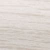 Cream-beige textured wallpaper covering a flat surface, showing subtle horizontal striations and faint mottling; close-up view with soft, even lighting, neutral, no additional elements.