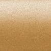 Gold metallic textured surface exhibiting a horizontal gradient—lighter at top, darker at bottom—shimmering with fine granular sparkle under even, diffuse lighting as a uniform background.
