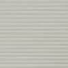Horizontal pleated cellular blind, fully closed and evenly lowered, diffusing soft light; set against a neutral-colored interior wall, creating uniform horizontal striping across the window area.