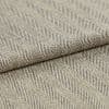 Folded beige-and-brown woven fabric with diagonal herringbone ribs; folded over itself forming parallel raised ridges; close-up on a flat surface under soft, neutral lighting.