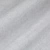 Light gray woven linen curtain, hanging in gentle horizontal folds with visible cross-weave texture; filtering soft, diffuse daylight in a neutral, close-up interior view (no visible window or room features).