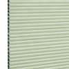 Cellular (honeycomb) blind, pale green with visible black cell edges — closed, pleated and covering the frame — close-up product view with even lighting and a neutral background.