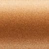 Fine copper-gold glitter surface occupying the frame; sparkling texture reflecting light; close-up view with a subtle horizontal gradient suggesting a metallic or fabric swatch under soft, even lighting.