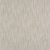 Textured beige-and-cream wallpaper with staggered narrow vertical rectangles — repeating pattern covering the entire surface, creating a subtle vertical rhythm in a softly lit interior close-up.