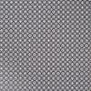 White interlocking circular-lattice pattern on navy fabric; repeating tessellated motif covering the entire surface; appears as flat wallpaper or upholstery in even, diffuse interior lighting.