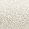 Frosted pebble-textured glass pane fills the frame, raised circular patterns obscuring detail; diffusing and softening bright backlight; neutral beige-gray tones, no visible surroundings.