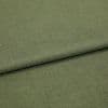 Olive-green woven fabric, folded once creating a horizontal ridge, displaying fine texture and subtle weave; close-up studio view with soft, even lighting.