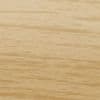 Light-colored wooden panel with subtle horizontal grain; smooth, matte surface occupying the frame; photographed close-up under even, warm studio lighting, no other objects or visible context.