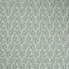 Wallpaper: repeating small gray-green leaf motif covering an entire surface; pattern repeats uniformly, creating subtle botanical texture on a softly lit interior wall.