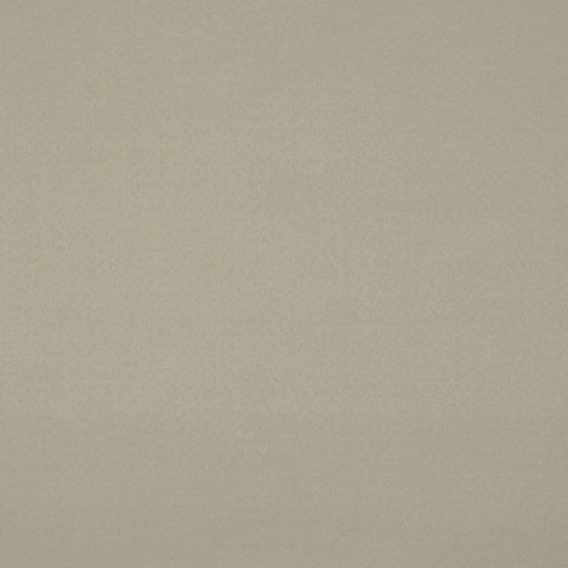 Beige textured wall covering the entire frame, showing subtle grain and faint creases; evenly lit, flat interior surface with no windows, furniture, or distinguishing features.