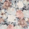 Textured fabric with abstract, watercolor-like floral blooms; soft vertical striations blur edges, creating mottled, cloudlike shapes. Muted pastel palette of blush, beige, blue and charcoal on flat surface.