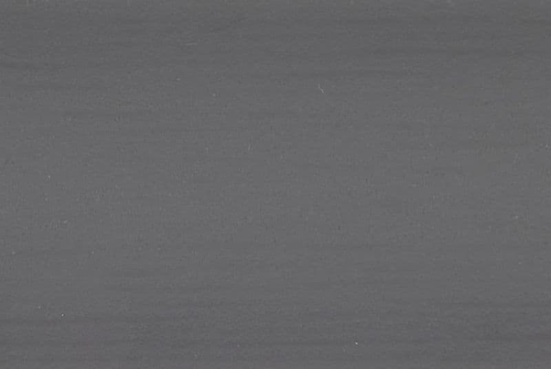 Gray fabric or paper surface with fine horizontal striations and tiny white specks; flat and static, uniformly lit, filling the frame as a close-up of a neutral textured background.