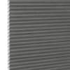 Gray cellular (honeycomb) pleated blind, fully lowered and closed, blocking light; close-up interior view showing textured fabric and white left-side gap under neutral lighting.