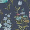 Floral sprigs and blossoms repeat across a dark slate-blue background; stems and leaves interweave, with small white, pink and yellow clustered flowers forming a vintage botanical wallpaper pattern.