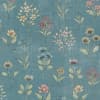 Small wildflower sprigs repeat across a teal, textured background; each delicate stem bears clusters of yellow, pink, blue, and cream blossoms, arranged in a regular, vintage wallpaper pattern.