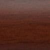 Dark reddish-brown wood surface (veneer) occupying the frame, showing fine horizontal grain and subtle sheen; flat tabletop under warm, diffuse lighting.