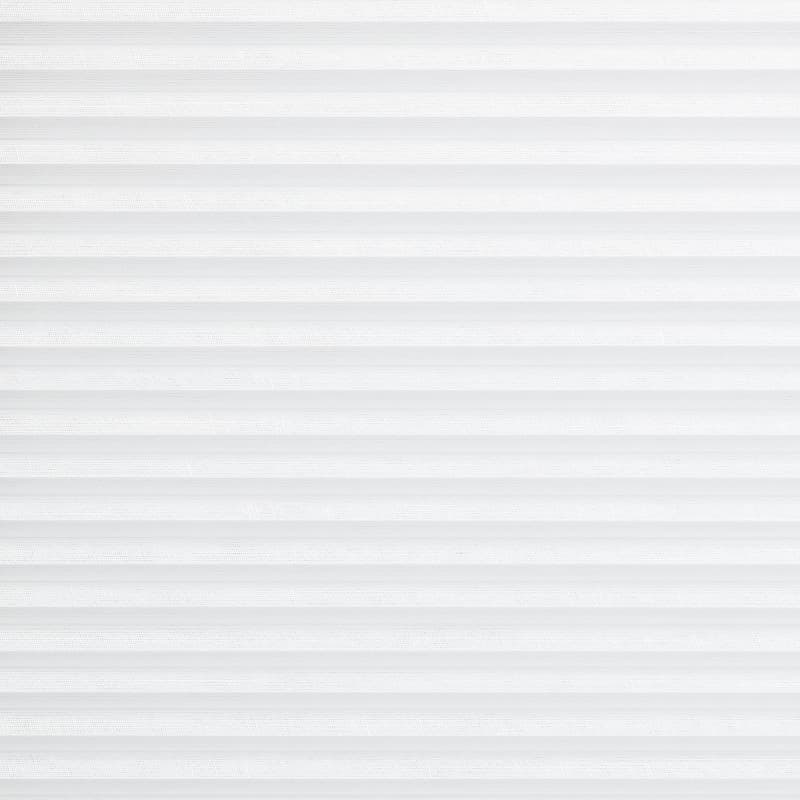 White horizontal pleated blind filling the frame, textured fabric with evenly spaced folds; closed, softly diffusing light; minimal context—no visible window frame or room, uniform bright neutral background.
