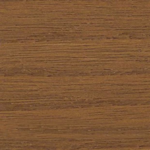 Brown wooden panel with fine horizontal grain, showing a smooth matte finish; photographed close-up under warm, even lighting with no visible surroundings.
