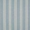 Vertical-striped woven fabric panel (soft blue with repeating off-white bands) hangs flat, covering the surface; subtle horizontal weave visible, suggesting wallpaper or a curtain in neutral lighting.