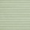 Pale green pleated cellular shade, fully closed and evenly aligned, filtering light subtly; fills the frame with textured horizontal ribs suggesting a softly lit interior window covering.
