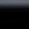 Horizontal dark gradient panel (object) showing faint horizontal banding and tiny light specks, appearing smooth and slightly reflective (action); occupying the entire frame in an abstract, low-light scene (context).