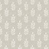 Textured wallpaper with white stylized leaf motifs arranged in a regular vertical grid, repeating across a gray-beige, slightly grainy surface under even, flat lighting.