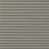 Horizontal metal roller shutter with narrow textured slats, fully closed and blocking light; fills the frame in neutral gray tones, evenly lit, resembling a storefront or covered window.