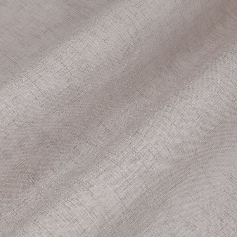 Sheer textured curtain fabric, light beige with a subtle crosshatch weave; draped in soft undulating folds; close-up view with diffuse, neutral lighting and no visible surroundings.