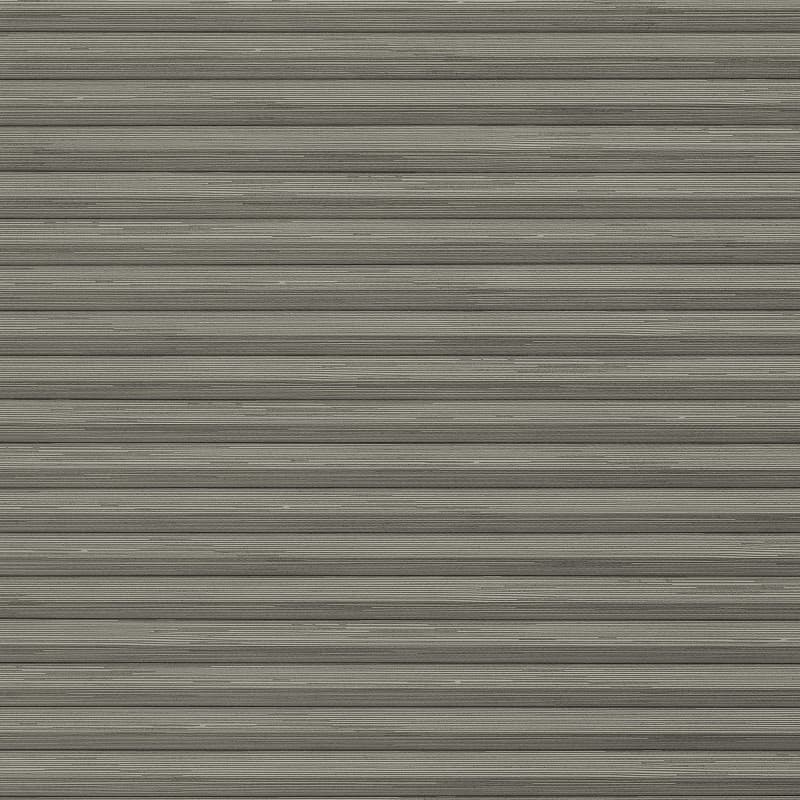 Horizontal corrugated metal roller shutter—narrow ridged slats spanning the frame—rolled fully down, closed; blocking light and view; plain gray surface suggesting a garage or storefront exterior in even daylight.