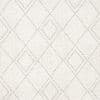 Cream textured wallpaper with faint taupe diamond lattice; pattern repeats across the surface, subtly distressed, filling a neutral, softly lit interior wall.