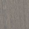Gray-stained oak veneer with tight vertical grain and subtle knots, showing fine parallel striations and slight weathering, filling the frame as a studio-lit close-up sample.