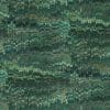 Teal-green marbled paper with dense combed teardrop motifs forming staggered diagonal bands; textured surface with subtle gold and black accents, resembling vintage book endpapers.