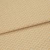 Mustard-and-white chevron fabric, tightly woven, folded across the frame; pattern repeats in narrow zigzags. Close-up view showing textured weave and soft, even lighting on a flat surface.